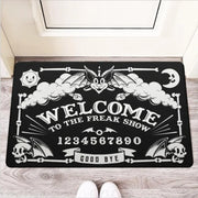 ’Welcome to the Freak Show’ Ouija-Themed Door Mat – Quirky Halloween and Gothic Home Decor - black / 40x60cm